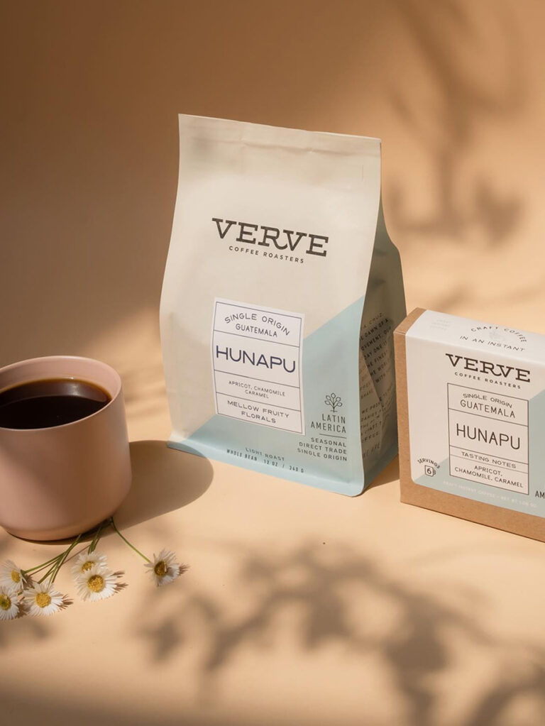 Verve Coffee Roasters coffee bag and box beside a cup of coffee and daisies